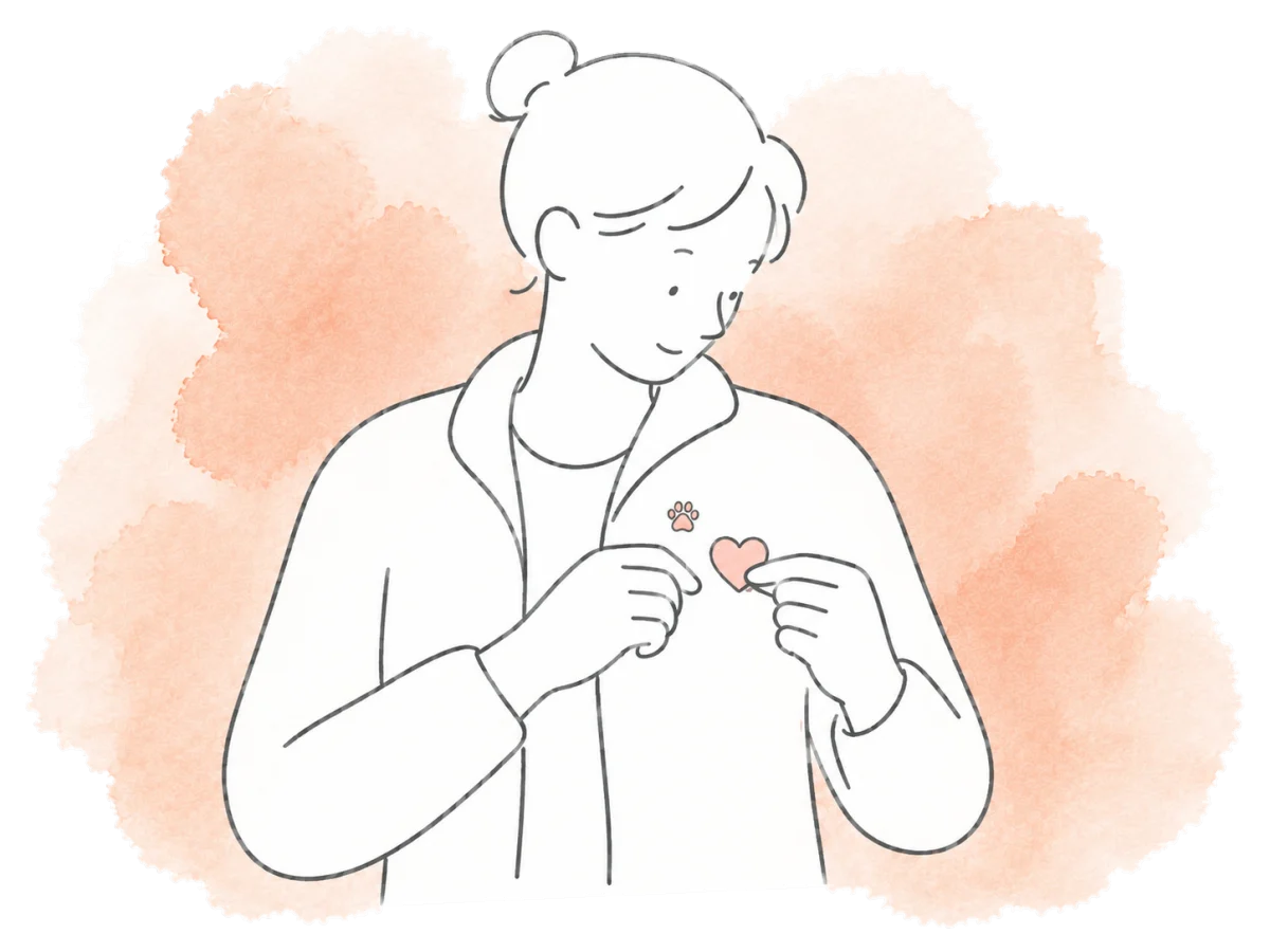A volunteer wears two small badges on the same jacket.