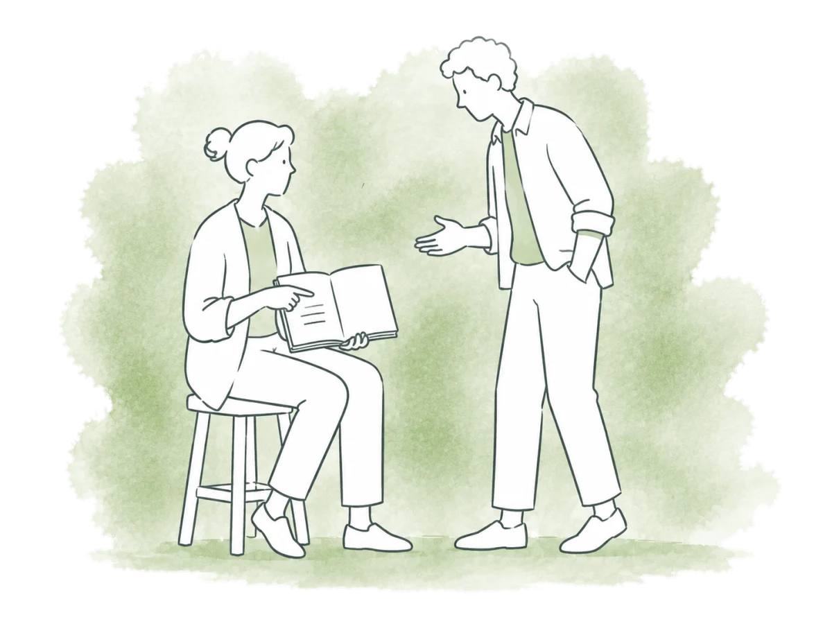 Two volunteers review the day's events together.