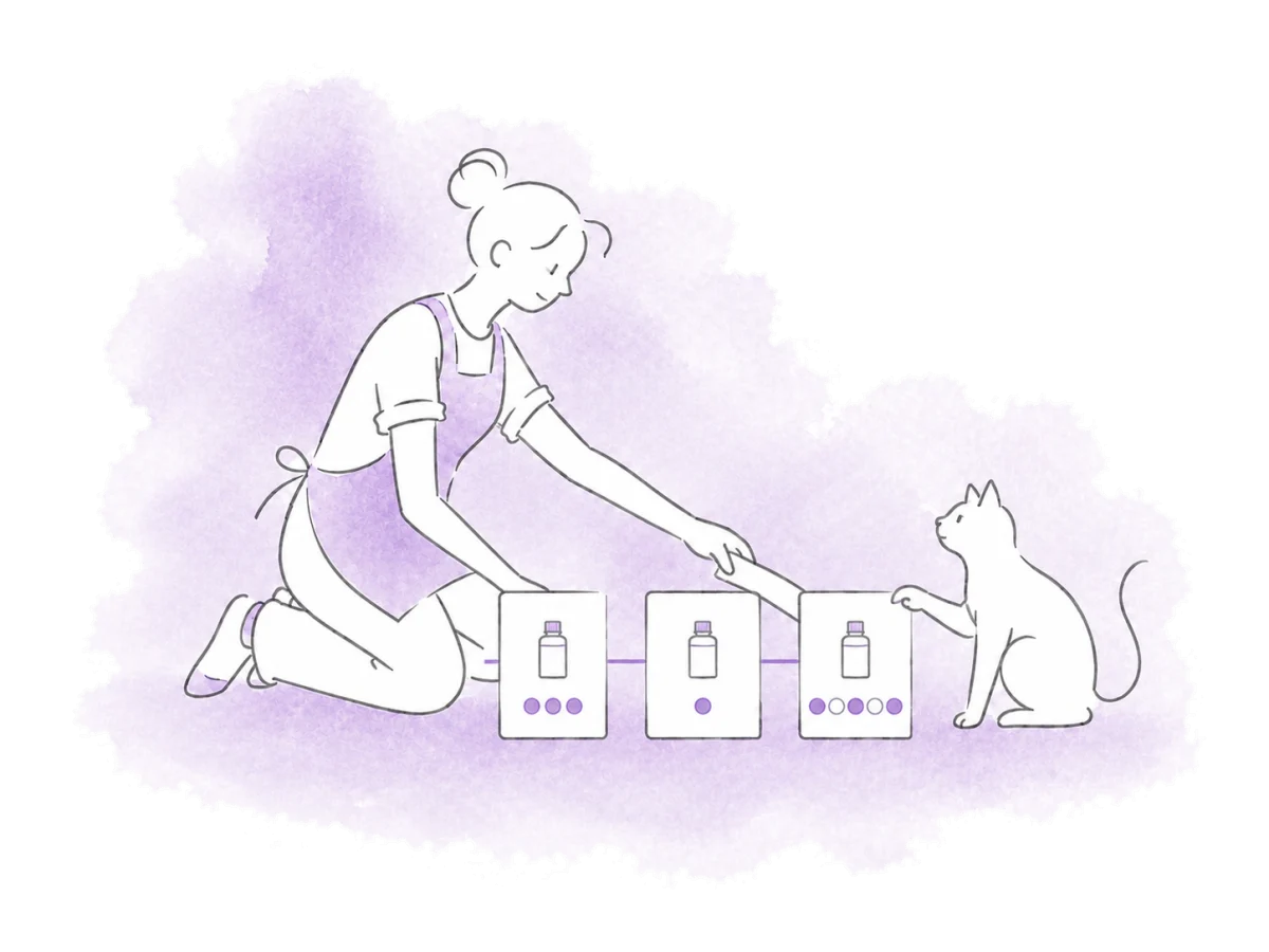 A volunteer connects three phases of a medication course beside a cat.