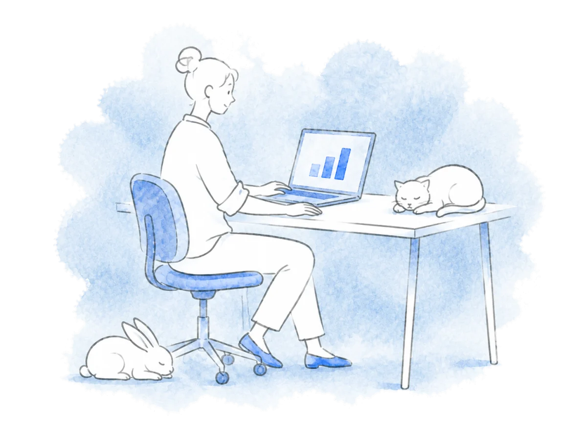 A coordinator reviews shared figures while animals rest nearby.