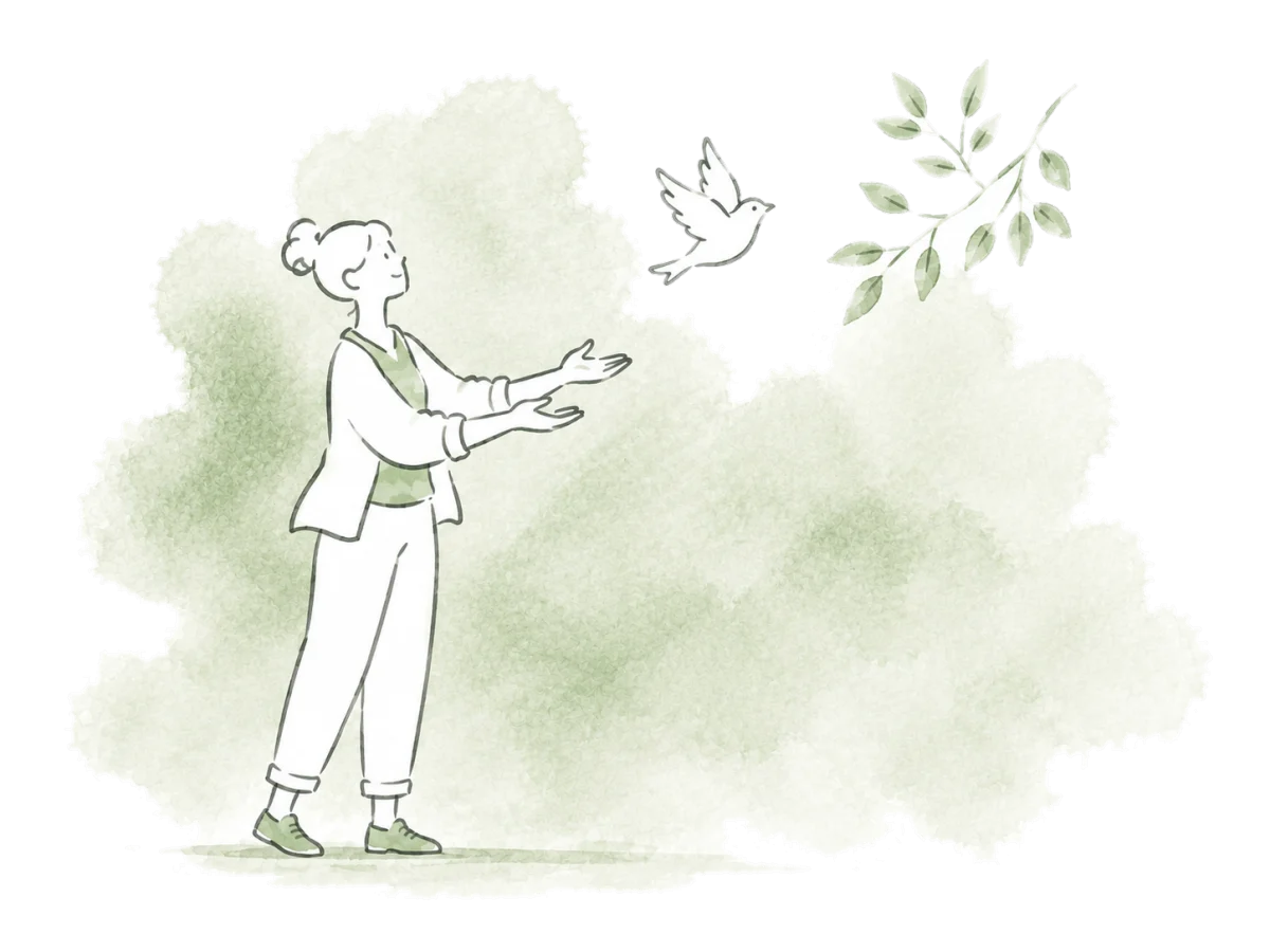 A rehabilitator watches a recovered bird fly free.